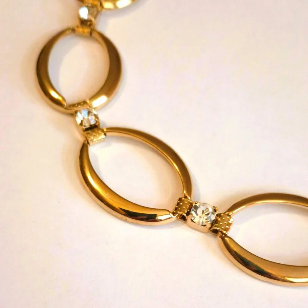 Avon gold tone